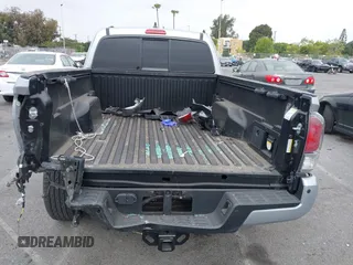 2022 Toyota Tacoma SR with VIN 3TYRZ5CN9NT022492, listed as a IAAI auction lot 42378801 with 9,312 mi miles and . Bid and sale history available at DreamBid. Image 16.
