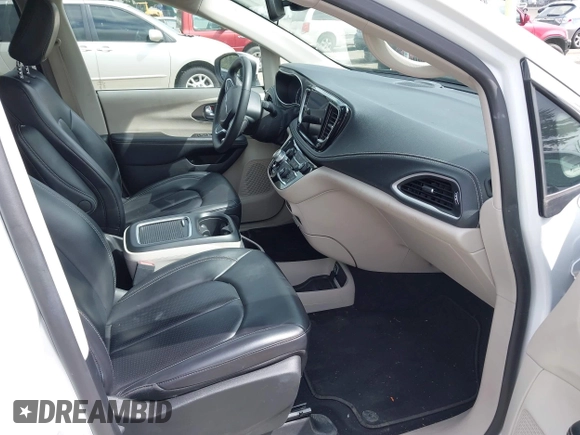 2023 Chrysler Pacifica Hybrid Touring L with VIN 2C4RC1L77PR541513, listed as a IAAI auction lot 42433421 with 53,979 mi miles and . Bid and sale history available at DreamBid. Image 5.