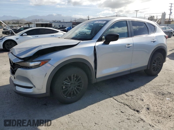 2019 Mazda CX-5 Touring with VIN JM3KFACMXK1556090, listed as a Copart auction lot 47541005 with 82,030 mi miles and Salvage Title. Bid and sale history available at carsss.com. Image 1.