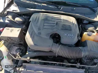 2020 Dodge Charger SXT с VIN 2C3CDXBG6LH140613, выставлен на аукционе Copart как лот 85189445 с пробегом 108 362 миль миль и Списание • Salvage title. История ставок и продаж доступна на DreamBid. Изображение 16.