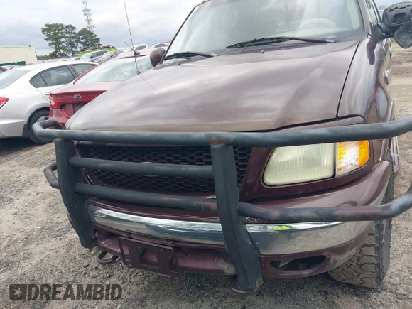 2002 Ford F-150 XLT with VIN 1FTRW08L02KA72005, listed as a IAAI auction lot 41723821 with 284,313 mi miles. Bid and sale history available at carsss.com. Image 6.