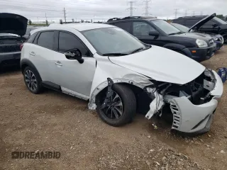 2019 Mazda CX-3 Touring with VIN JM1DKFC75K0430357, listed as a Copart auction lot 66206334 with 22,684 mi miles and Salvage Title. Bid and sale history available at DreamBid. Image 4.