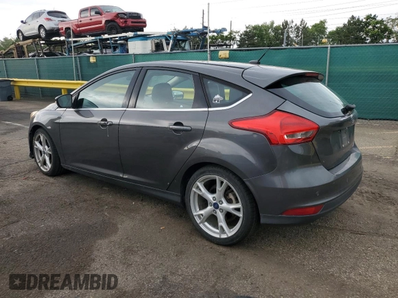 2016 Ford Focus Titanium z VIN 1FADP3N27GL329026, wystawiony jako Copart lot #60910475 z przebiegiem 98 794 mil mil oraz Szkoda całkowita • Salvage title. Historia ofert i sprzedaży dostępna na DreamBid. Obrazek 2.