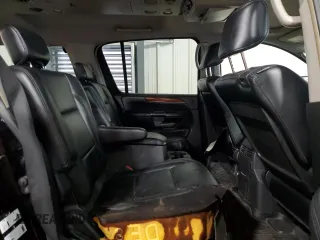 2010 Infiniti QX56 with VIN 5N3ZA0NE4AN903946, listed as a Copart auction lot 60535685 with 204,634 mi miles and Salvage title. Bid and sale history available at DreamBid. Image 11.