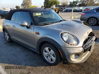 2019 MINI Convertible Cooper с VIN WMWWG5C5XK3F79624, выставлен на аукционе Copart как лот 42047405 с пробегом 52 977 миль миль и Списание • Salvage title. История ставок и продаж доступна на DreamBid. Изображение 4.