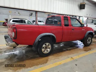1999 Nissan Frontier XE with VIN 1N6ED26Y5XC308158, listed as a Copart auction lot 84320904 with 316,532 mi miles and Clean title. Bid and sale history available at DreamBid. Image 3.