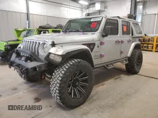 2022 Jeep Wrangler Unlimited Sahara with VIN 1C4HJXEG4NW164726, listed as a Copart auction lot 85481574 with 33,373 mi miles and Salvage Title. Bid and sale history available at DreamBid. Image 1.