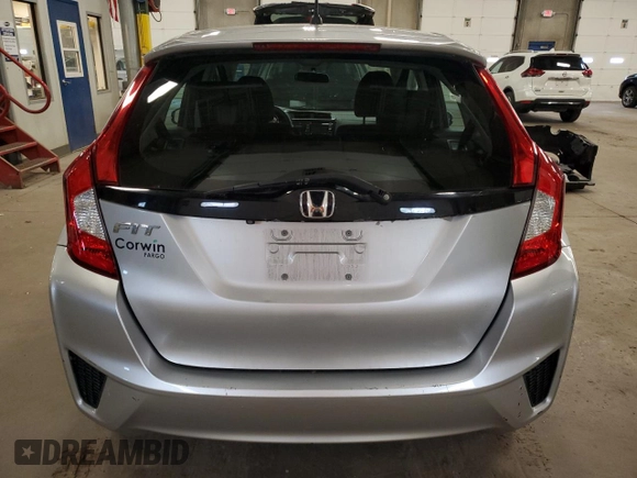 2015 Honda Fit LX с VIN 3HGGK5H56FM720996, выставлен на аукционе Copart как лот 57565945 с пробегом 90 222 миль миль и Списание • Salvage title. История ставок и продаж доступна на DreamBid. Изображение 6.