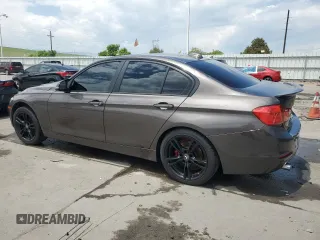 2014 BMW 3 Series 320i xDrive with VIN WBA3C3C53EK200375, listed as a Copart auction lot 59915595 with 104,320 mi miles and Salvage title. Bid and sale history available at DreamBid. Image 2.