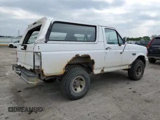 1996 Ford Bronco XL z VIN 1FMEU15N7TLB20204, wystawiony jako Copart lot #58887615 z przebiegiem 214 944 mil mil oraz Czysty tytuł • Clean title. Historia ofert i sprzedaży dostępna na DreamBid. Obrazek 3.