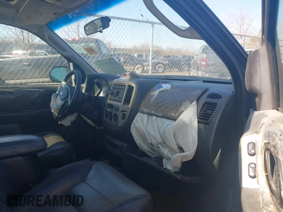 2003 Ford Escape XLT Popular with VIN 1FMYU03103KD07779, listed as a IAAI auction lot 42019919 with 245,522 mi miles. Bid and sale history available at carsss.com. Image 5.