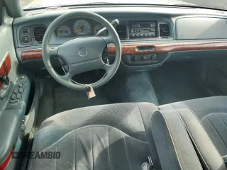 1997 Mercury Grand Marquis GS z VIN 2MELM74W7VX687221, wystawiony jako Copart lot #78665224 z przebiegiem 226 077 mil mil oraz Szkoda całkowita • Salvage title. Historia ofert i sprzedaży dostępna na DreamBid. Obrazek 8.