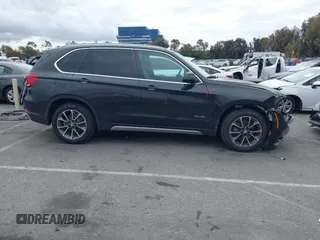 2018 BMW X5 xDrive35i with VIN 5UXKR0C55JL073210, listed as a IAAI auction lot 42047558 with 37,497 mi miles. Bid and sale history available at carsss.com. Image 14.
