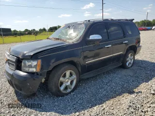 2010 Chevrolet Tahoe LTZ z VIN 1GNUCCE04AR207420, wystawiony jako Copart lot #57065055 z przebiegiem 181 782 mil mil oraz Szkoda całkowita • Salvage title. Historia ofert i sprzedaży dostępna na DreamBid. Obrazek 1.
