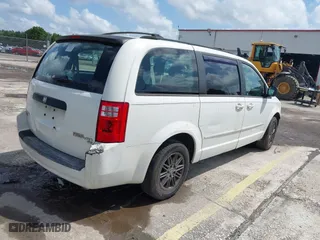 2010 Dodge Grand Caravan SE with VIN 2D4RN4DE5AR490306, listed as a IAAI auction lot 41944376 with 127,107 mi miles. Bid and sale history available at carsss.com. Image 4.