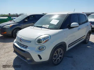 2014 FIAT 500L Trekking with VIN ZFBCFADH2EZ007586, listed as a IAAI auction lot 42040589 with 69,793 mi miles. Bid and sale history available at carsss.com. Image 2.