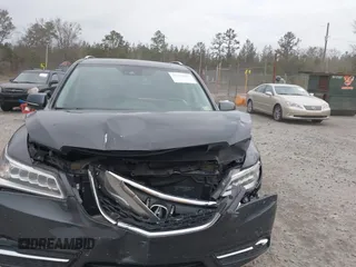 2016 Acura MDX w/Tech with VIN 5FRYD3H48GB005540, listed as a IAAI auction lot 41722697 with 74,793 mi miles. Bid and sale history available at carsss.com. Image 12.