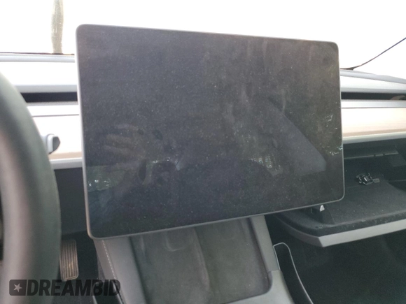 2023 Tesla Model 3 z VIN 5YJ3E1EA9PF656845, wystawiony jako Copart lot #53199405 z przebiegiem Nie podano mil oraz Szkoda całkowita • Salvage title. Historia ofert i sprzedaży dostępna na DreamBid. Obrazek 9.