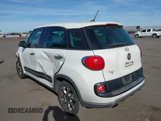 2014 FIAT 500L Trekking with VIN ZFBCFADH9EZ010937, listed as a IAAI auction lot 41385156 with 166,593 mi miles and . Bid and sale history available at DreamBid. Image 3.