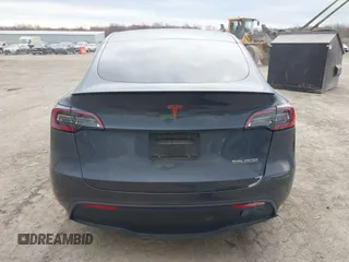 2023 Tesla Model Y Performance with VIN 7SAYGDEF2PF757113, listed as a IAAI auction lot 41881175 with 54,809 mi miles and . Bid and sale history available at DreamBid. Image 17.