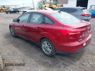 2015 Ford Focus SE with VIN 1FADP3F21FL296327, listed as a IAAI auction lot 42171777 with 122,135 mi miles and . Bid and sale history available at DreamBid. Image 3.
