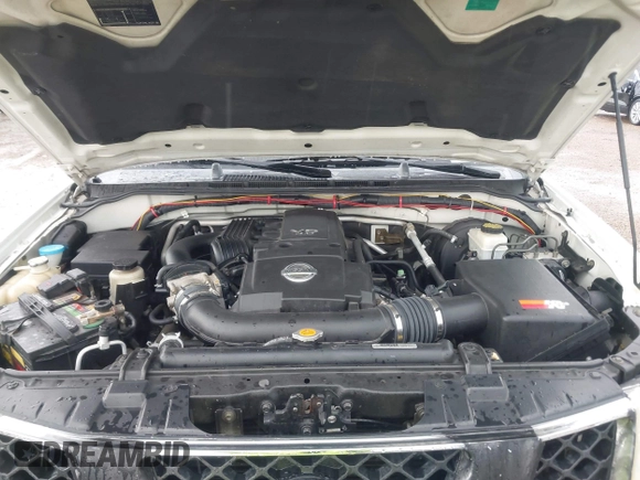 2007 Nissan Frontier SE z VIN 1N6AD09U67C407602, wystawiony jako IAAI lot #42405830 z przebiegiem Nie podano mil oraz . Historia ofert i sprzedaży dostępna na DreamBid. Obrazek 10.