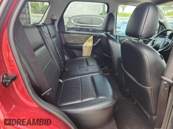 2006 Ford Escape Limited z VIN 1FMCU041X6KB19851, wystawiony jako Copart lot #63636955 z przebiegiem 98 400 mil mil oraz Szkoda całkowita • Salvage title. Historia ofert i sprzedaży dostępna na DreamBid. Obrazek 11.