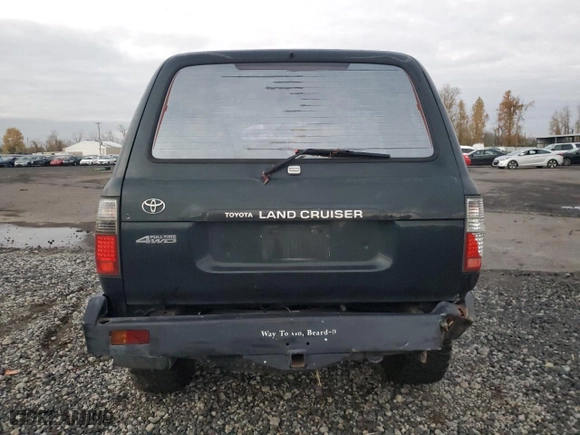 1996 Toyota Land Cruiser with VIN JT3HJ85JXT0142784, listed as a Copart auction lot 81755434 with 370,361 mi miles and Salvage Title. Bid and sale history available at carsss.com. Image 6.
