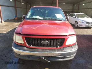 2000 Ford F-150 XL with VIN 1FTRX17L7YKA59717, listed as a IAAI auction lot 40887691 with 104,095 mi miles. Bid and sale history available at carsss.com. Image 12.