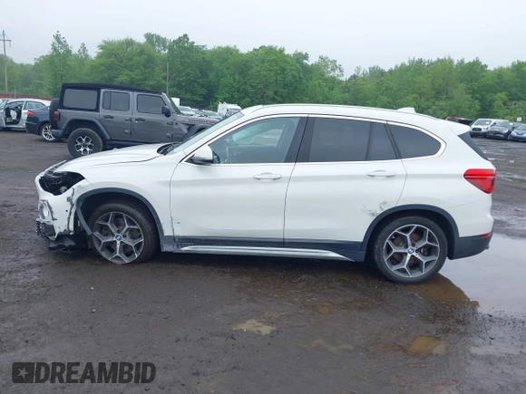 2018 BMW X1 xDrive28i with VIN WBXHT3C38J5L31322, listed as a IAAI auction lot 42260190 with 70,266 mi miles and . Bid and sale history available at DreamBid. Image 14.