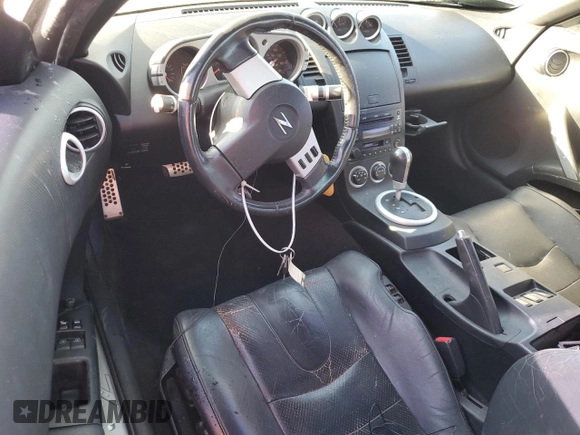 2004 Nissan 350Z Enthusiast z VIN JN1AZ36A74T015422, wystawiony jako Copart lot #77537194 z przebiegiem 147 466 mil mil oraz Nie do naprawy • Non repairable. Historia ofert i sprzedaży dostępna na DreamBid. Obrazek 8.