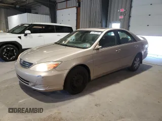 2004 Toyota Camry LE with VIN 4T1BE30K24U916475, listed as a Copart auction lot 61362385 with 267,490 mi miles and Salvage title. Bid and sale history available at DreamBid. Image 1.