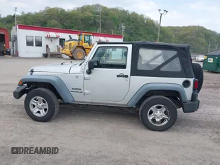 2011 Jeep Wrangler Sport with VIN 1J4AA2D18BL546069, listed as a IAAI auction lot 42139693 with 56,395 mi miles and . Bid and sale history available at carsss.com. Image 15.