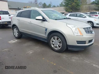 2011 Cadillac SRX Luxury Collection with VIN 3GYFNAEY4BS663447, listed as a IAAI auction lot 42134933 with 153,411 mi miles. Bid and sale history available at carsss.com. Image 1.