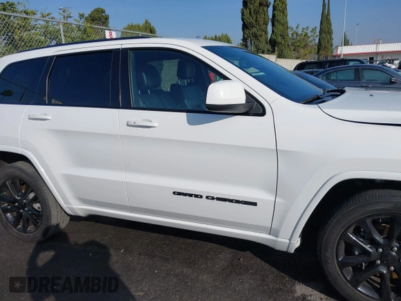 2020 Jeep Grand Cherokee Altitude with VIN 1C4RJEAG2LC306195, listed as a IAAI auction lot 41626392 with 45,587 mi miles and . Bid and sale history available at DreamBid. Image 14.