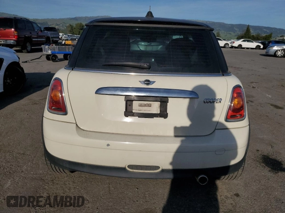 2010 MINI Hardtop with VIN WMWMF3C52ATZ65593, listed as a Copart auction lot 50107445 with 105,389 mi miles and Salvage title. Bid and sale history available at DreamBid. Image 6.