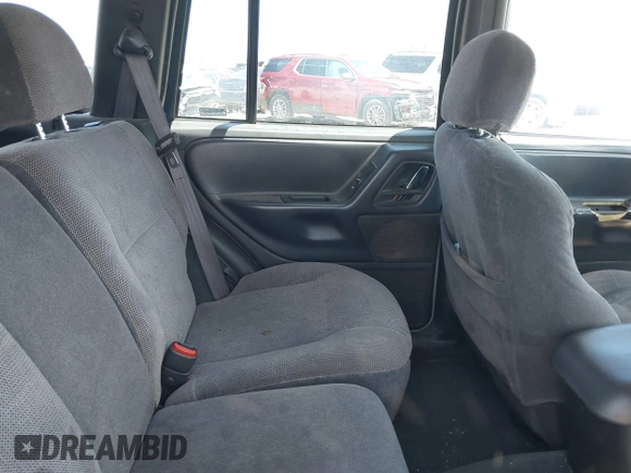 2000 Jeep Grand Cherokee Laredo with VIN 1J4GW48S8YC172274, listed as a IAAI auction lot 39738087 with 335,809 mi miles and . Bid and sale history available at DreamBid. Image 8.