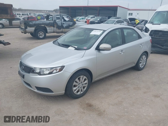 2012 Kia Forte EX with VIN KNAFU4A25C5591601, listed as a IAAI auction lot 42071351 with 120,636 mi miles. Bid and sale history available at carsss.com. Image 2.