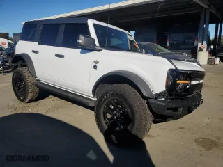 2024 Ford Bronco Wildtrak with VIN 1FMEE2BP5RLA89892, listed as a Copart auction lot 87688255 with 4,479 mi miles and Salvage Title. Bid and sale history available at carsss.com. Image 4.