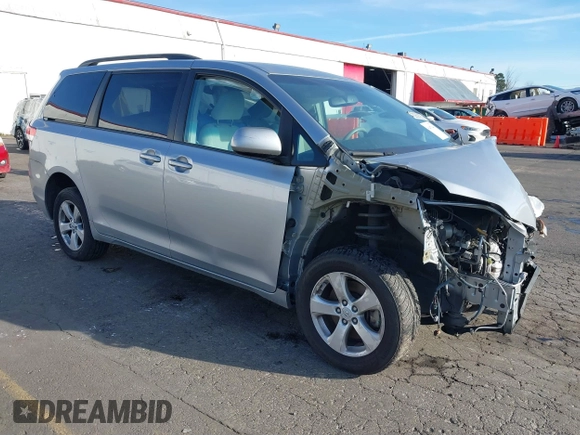 2014 Toyota Sienna LE with VIN 5TDJK3DC4ES088768, listed as a IAAI auction lot 41473251 with 100,512 mi miles and . Bid and sale history available at DreamBid. Image 1.