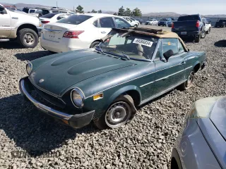 1972 FIAT 124 Spider z VIN 124CS10127996, wystawiony jako Copart lot #69366834 z przebiegiem 7 880 mil mil oraz Szkoda całkowita • Salvage title. Historia ofert i sprzedaży dostępna na DreamBid. Obrazek 1.