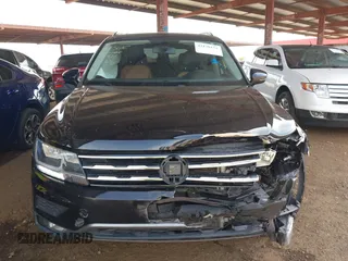 2018 Volkswagen Tiguan SEL z VIN 3VV3B7AX1JM036551, wystawiony jako IAAI lot #42170151 z przebiegiem 97 506 mil mil oraz . Historia ofert i sprzedaży dostępna na DreamBid. Obrazek 6.