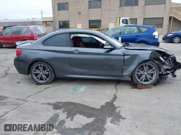 2015 BMW 2 Series M235i with VIN WBA1J7C50FV358774, listed as a IAAI auction lot 41559637 with 82,344 mi miles and . Bid and sale history available at carsss.com. Image 14.