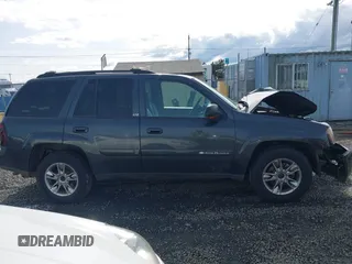 2003 Chevrolet TrailBlazer LTZ with VIN 1GNDT13S332400873, listed as a IAAI auction lot 41939816 with 152,996 mi miles and . Bid and sale history available at DreamBid. Image 13.