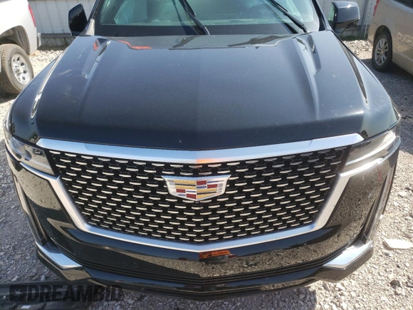 2023 Cadillac Escalade ESV 4WD Premium Luxury z VIN 1GYS4KKL0PR478788, wystawiony jako Copart lot #70177094 z przebiegiem Nie podano mil oraz Szkoda całkowita • Salvage title. Historia ofert i sprzedaży dostępna na DreamBid. Obrazek 12.