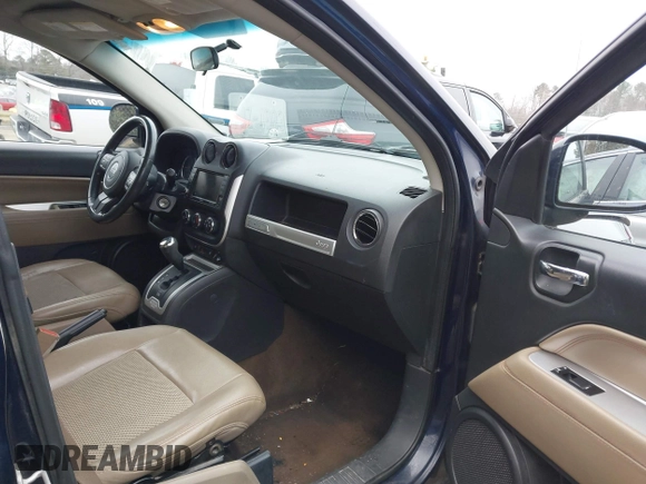 2014 Jeep Compass High Altitude with VIN 1C4NJCEA8ED522686, listed as a IAAI auction lot 41611351 with 220,145 mi miles and . Bid and sale history available at DreamBid. Image 5.