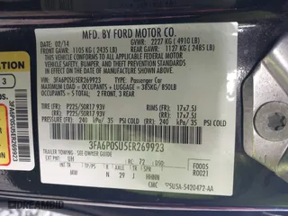 2014 Ford Fusion Energi Titanium with VIN 3FA6P0SU5ER269923, listed as a IAAI auction lot 41086950 with 135,351 mi miles. Bid and sale history available at carsss.com. Image 9.
