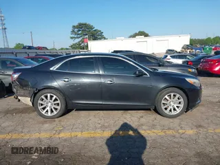 2014 Chevrolet Malibu LTZ with VIN 1G11H5SL9EF123813, listed as a IAAI auction lot 41984575 with 204,536 mi miles and . Bid and sale history available at DreamBid. Image 13.