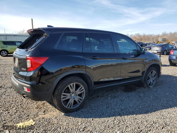 2021 Honda Passport EX-L with VIN 5FNYF8H59MB004250, listed as a Copart auction lot 82094584 with 63,205 mi miles and Salvage Title. Bid and sale history available at carsss.com. Image 3.