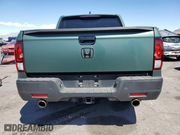 2022 Honda Ridgeline RTL-E with VIN 5FPYK3F73NB014672, listed as a Copart auction lot 54617475 with 76,160 mi miles and Salvage title. Bid and sale history available at DreamBid. Image 6.